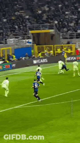 A Group Of Soccer Players On A Field With The Number 30 On The Back Of Their Jersey GIF