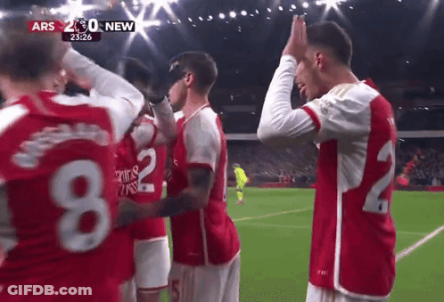 A Group Of Soccer Players On A Field With The Number 8 And 22 On Their Jerseys GIF