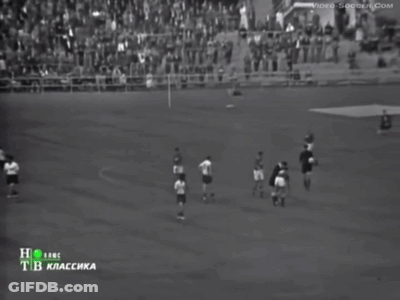 A Group Of Soccer Players Standing On A Field With The Number 4 On Their Jersey GIF