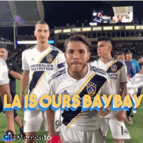 A Group Of Soccer Players Standing On A Field With The Words La Is Ours Bay Bay GIF