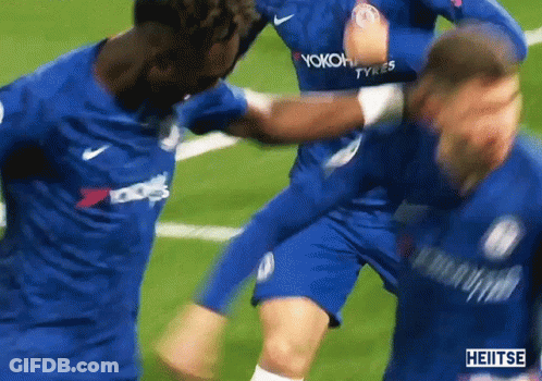 A Group Of Soccer Players Wearing Blue Jerseys With Yokohama Tyres Written On Them GIF