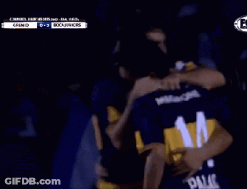 A Group Of Soccer Players Wearing Boca Juniors Uniforms GIF