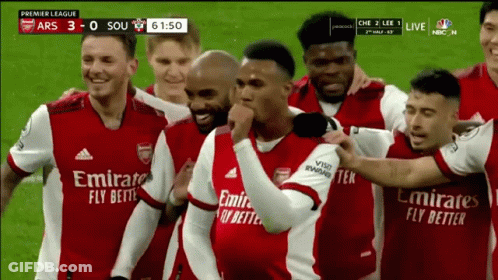 A Group Of Soccer Players Wearing Emirates Fly Better Uniforms GIF