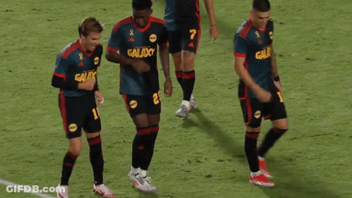 A Group Of Soccer Players Wearing Galaxy Uniforms GIF