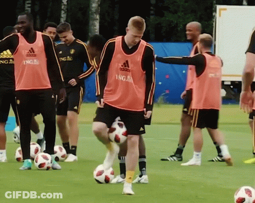 A Group Of Soccer Players Wearing Ing Jerseys GIF