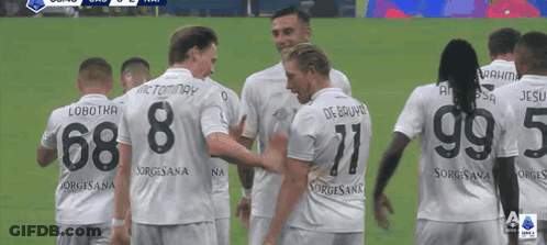 A Group Of Soccer Players Wearing Jerseys With The Numbers 68 8 71 And 99 5 GIF