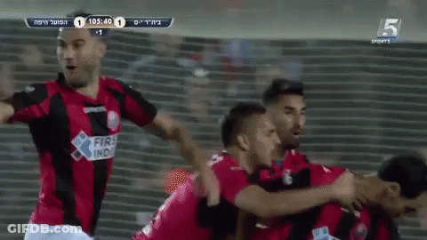 A Group Of Soccer Players Wearing Red And Black Jerseys With The Number 5 On The Bottom Right GIF