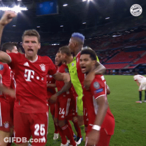 A Group Of Soccer Players Wearing Red Jerseys With T-Mobile On The Front GIF