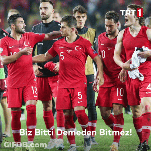 A Group Of Soccer Players Wearing Red Jerseys With Trt 1 Written On The Bottom GIF