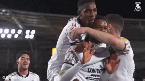 A Group Of Soccer Players With One Wearing A Jersey That Says " Unibet " GIF