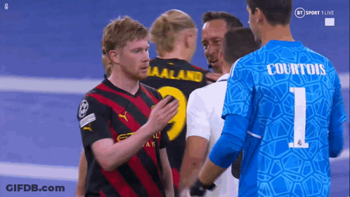 A Group Of Soccer Players With One Wearing A Number 1 Jersey GIF