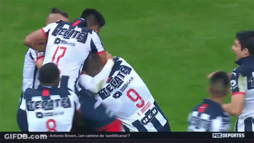 A Group Of Soccer Players With One Wearing A Number 9 Jersey GIF