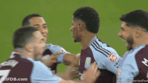 A Group Of Soccer Players With One Wearing A Shirt With The Number 7 On It GIF
