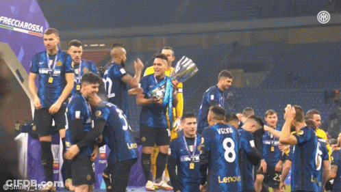 A Group Of Soccer Players With One Wearing The Number 8 On Their Jersey GIF