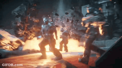 A Group Of Soldiers Are Fighting Each Other In A Video Game In A Dark Room . GIF