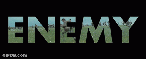 A Group Of Soldiers Are Running In A Field With The Word Nem Behind Them . GIF