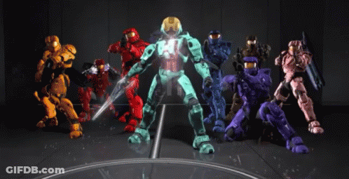 A Group Of Soldiers Are Standing In A Line And One Of Them Is Wearing A Green Helmet GIF