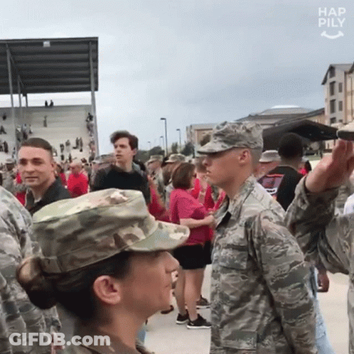 Soldiers Standing Next To Crowd GIF