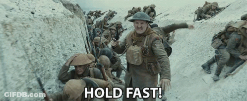 A Group Of Soldiers In A Trench With The Words Hold Fast Written On The Bottom GIF