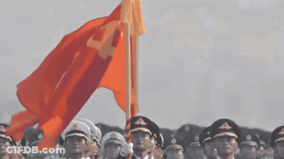 A Group Of Soldiers Marching In A Line With The Letter T On Their Uniform GIF