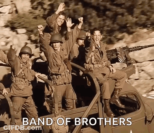 A Group Of Soldiers Riding In The Back Of A Truck With The Words Band Of Brothers Written Below Them GIF