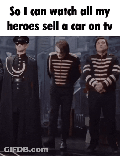 A Group Of Soldiers Standing Next To Each Other With The Caption So I Can Watch All My Heroes Sell A Car On Tv GIF
