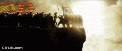 A Group Of Soldiers Standing On Top Of A Hill With Flags GIF