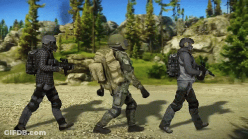 A Group Of Soldiers Walking Down A Dirt Road GIF