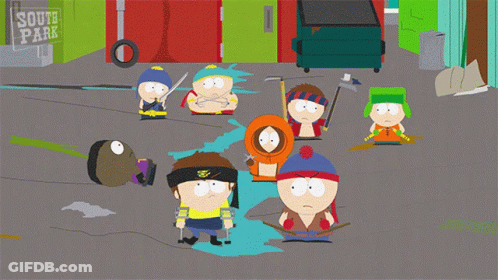 A Group Of South Park Characters Standing On A Street GIF
