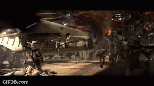 A Group Of Storm Trooper Soldiers Are Standing In Front Of A Destroyed Vehicle GIF