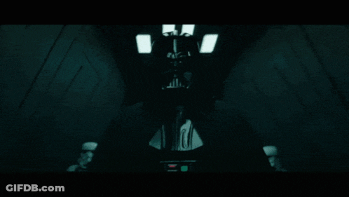 A Group Of Stormtroopers Are Standing In A Room GIF