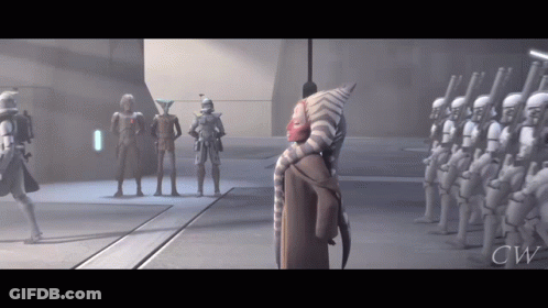 A Group Of Stormtroopers Are Standing In A Room With A Woman Standing In The Middle GIF