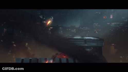 A Group Of Stormtroopers Holding Guns In A Battle Scene GIF