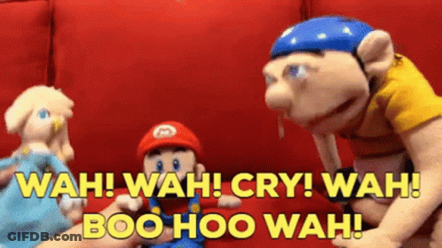 A Group Of Stuffed Animals Are Sitting On A Red Couch And Talking To Each Other . GIF