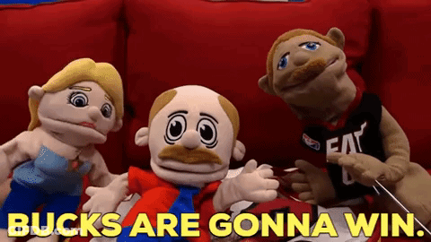 A Group Of Stuffed Animals Are Sitting On A Red Couch With The Words Bucks Are Gonna Win GIF