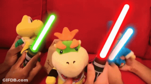 Stuffed Animals Holding Lightsabers GIF