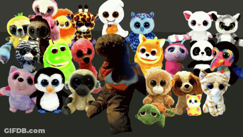 A Group Of Stuffed Animals Including A Penguin And A Frog Are Gathered Together GIF