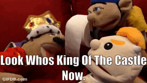 A Group Of Stuffed Animals With The Words Look Whos King Of The Castle Now Below Them GIF