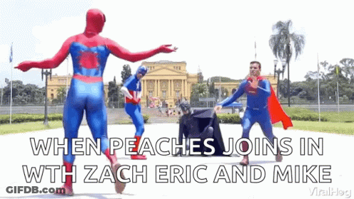 A Group Of Superheros Are Dancing In Front Of A Building With The Caption When Peaches Joins In With Zach Eric And Mike GIF