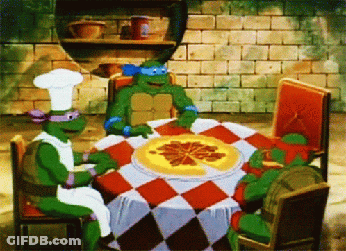 A Group Of Teenage Mutant Ninja Turtles Are Sitting Around A Table Eating Pizza GIF