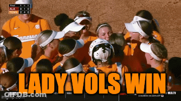 A Group Of Tennessee Softball Players Huddle Together With The Words Lady Vols Win Above Them GIF