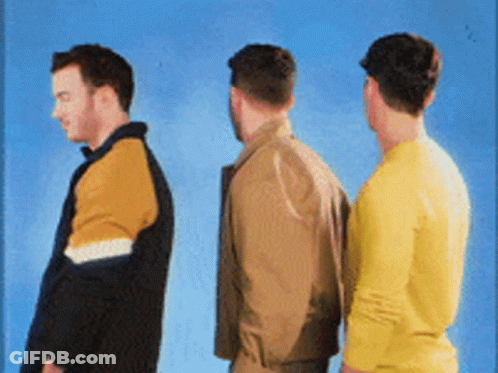 A Group Of Three Men Standing Next To Each Other On A Blue Background GIF