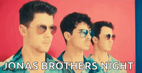 A Group Of Three Men Wearing Sunglasses Are Standing Next To Each Other . GIF