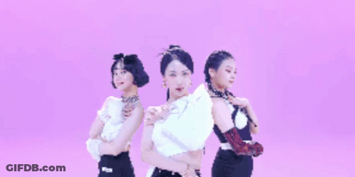 A Group Of Three Women Standing Next To Each Other On A Purple Background GIF