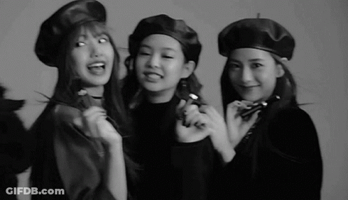 A Group Of Three Women Wearing Beret Hats Are Posing For A Black And White Photo . GIF