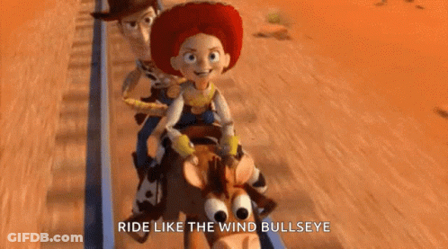 A Group Of Toy Story Characters Are Riding A Roller Coaster . GIF