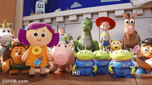 A Group Of Toy Story Characters Are Standing On A Wooden Floor And One Of Them Is Saying Hi GIF
