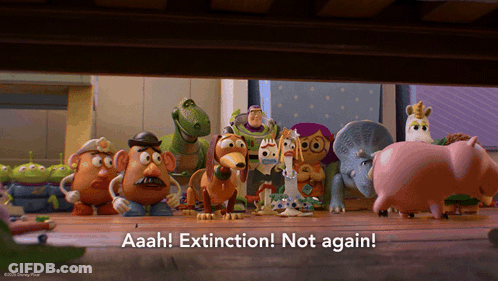 A Group Of Toy Story Characters Are Standing On A Wooden Floor With The Words Aaah Extinction Not Again GIF