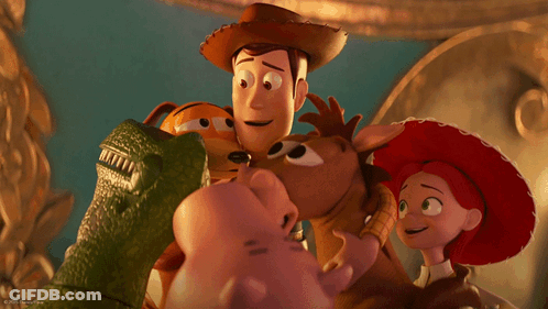 A Group Of Toy Story Characters Including Woody And Slinky GIF