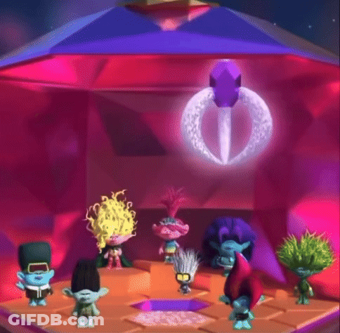A Group Of Trolls Are Standing In A Room In Front Of A Pyramid . GIF